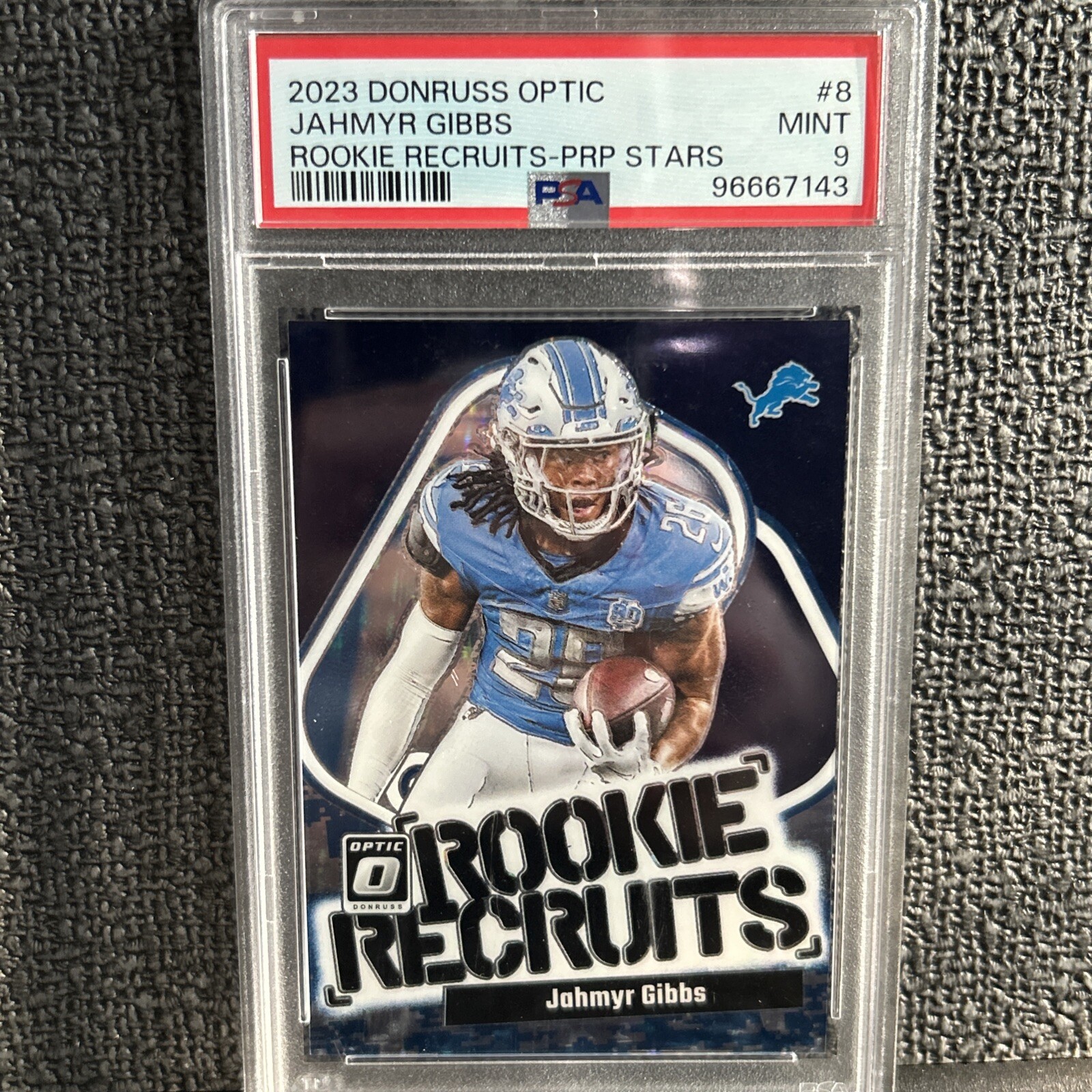 2023 Donruss Optic Jahmyr Gibbs RC Purple Stars Rookie Recruits/25 - PSA 9 Pop 2