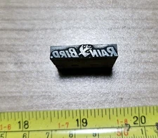 Vintage Letterpress Printing Block Rain Bird Advertising logo