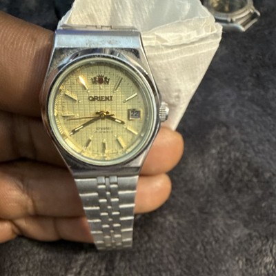 Orient Crystal Men s Automatic Analog Wristwatch Gold Dial Silver Steel Date