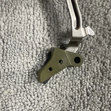 FLAT FACE CARRY TRIGGER W/ BAR F GEN 1-4 FOR GL0CK MOD 17, 19, 23, 26, 27, BAG/B