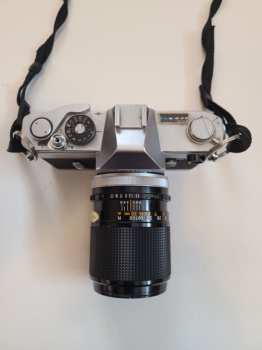Canon FX + FD 135mm f3.5 Lens SLR 35mm film camera -- EXC, working