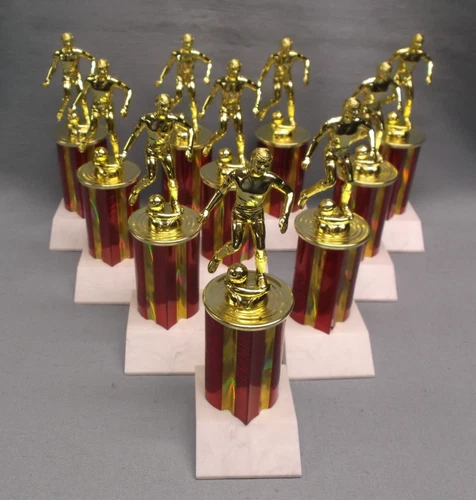 team lot of 10 male soccer trophies award red column