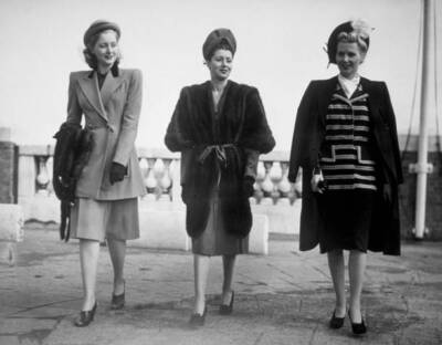 From left right, Grace wears gold-brown suit by Fishelis, Maree we - 1946 Photo
