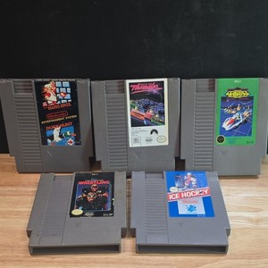 Nintendo NES Game Cartridge Lot Super Mario/Duck Hunt Ice Hockey WCW 1942