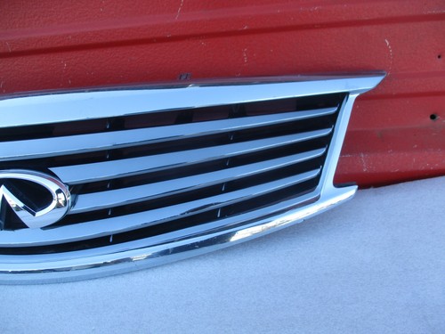 2010-2015 INFINITI G25 G37 Q40 FRONT BUMPER GRILLE EMBLEM OEM 62310-1NF1A - Picture 4 of 13