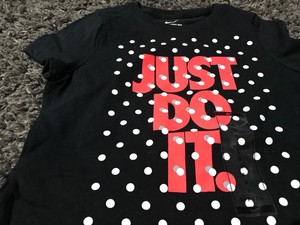 black t shirt with white dots