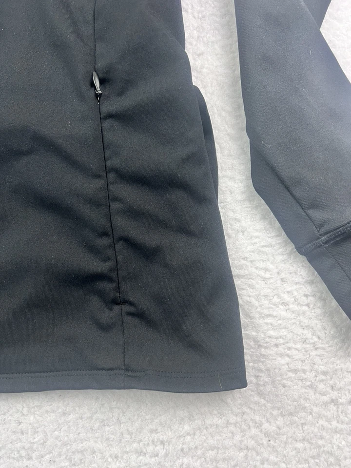 Chaqueta activa negra para mujer Fabletics bolsillos con cremallera talla mediana Foto 2 de 4