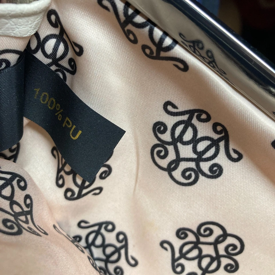 Bolso sin asas Jessica Simpson arco rosa claro 10x5 PU JS393 bloqueo de beso Foto 4 de 4