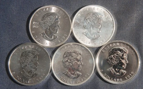 FIVE (5)  1 OZ .9999 SILVER  MAPLE LEAF COINS (2010- 2023)  LOT 131015