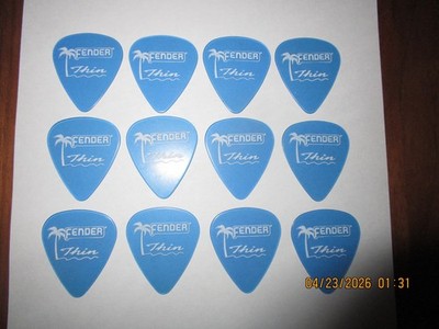 12 Pack of Fender Clear Palm Tree Guitar Picks Lake Placid Blue Thin Gauge #4012