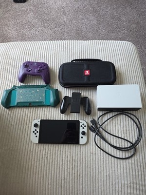 Nintendo Switch White OLED Bundle With Skyrim, 128GB SD card, and accessories 
