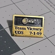 AT&T Team Victory UDS 7-1-89 Enamel Gold/Black Impact Design Company Vintage Pin