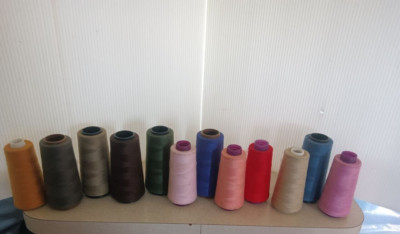 12 LARGE SPOOLS OF SEWING THREAD