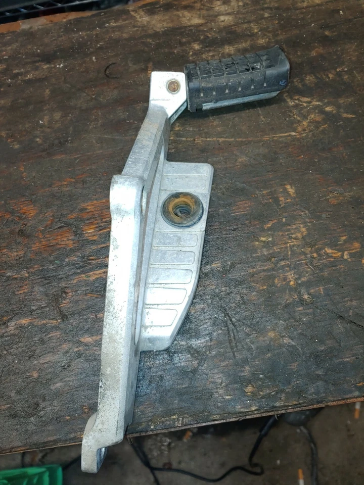 1983 1984 1985 Honda nighthawk 650SC left rear foot peg with exhaust bracket - Image 3 of 4