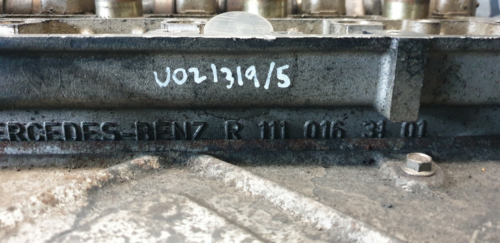 OM) MERCEDES W202 C CLASS CYLINDER HEAD W/MANIFOLD R1110161601  