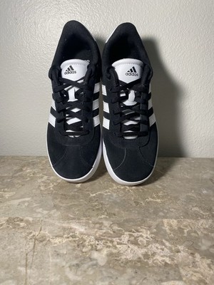 Black And White Adidas Size4 1/2. Used In Excellent Conditions.No Box See Photos