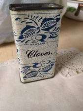 Vintage Rawleigh's Cloves 3.2 oz spice tin, great graphics/colors partially full