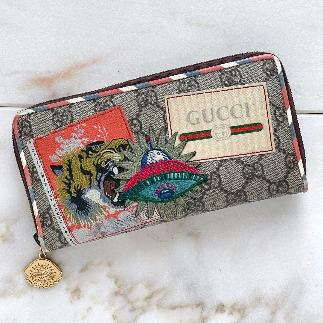 Portefeuille long GUCCI Gucci GG Supreme Courier Courier