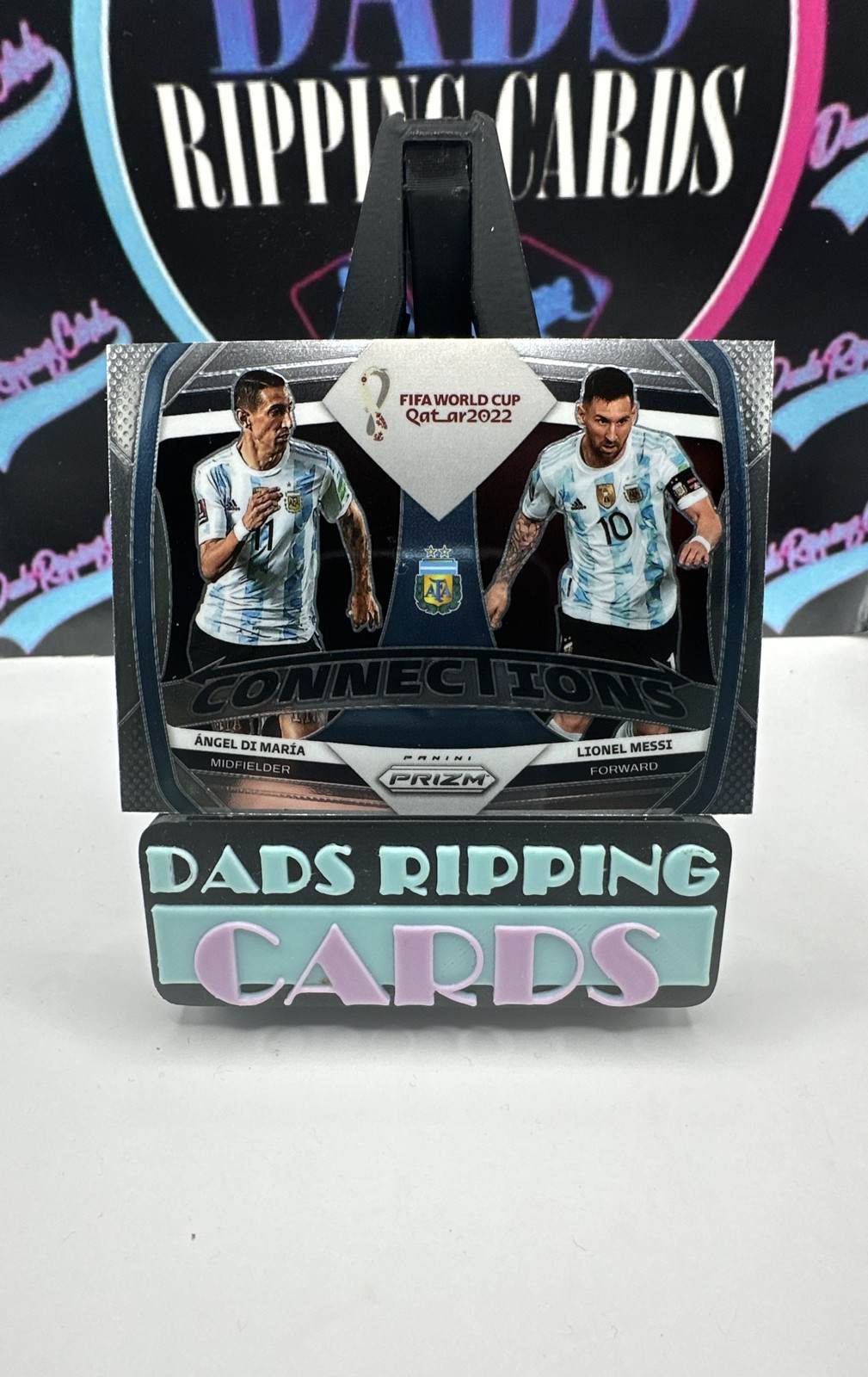 2022 Panini Prizm World Cup Qatar - Connections Lionel Messi, Angel Di Maria #1