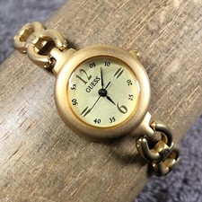 Vintage Guess Women Dress Matte Gold Tone Round 23mm Quartz Analog Watch 7"