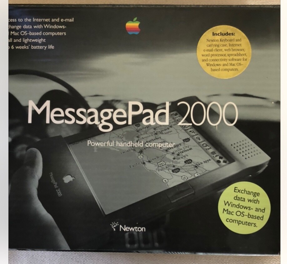 Newton/ Apple MessagePad 2000 with plug-in boards, battery, and 