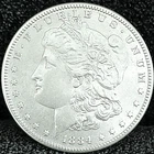 1884 S Morgan Dollar AU++ Great Eye Appeal Excellent Strike. 100% Original White