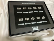 The legendary Nikons camera models Nikon 1948 - 1988 metal bas-reliefs