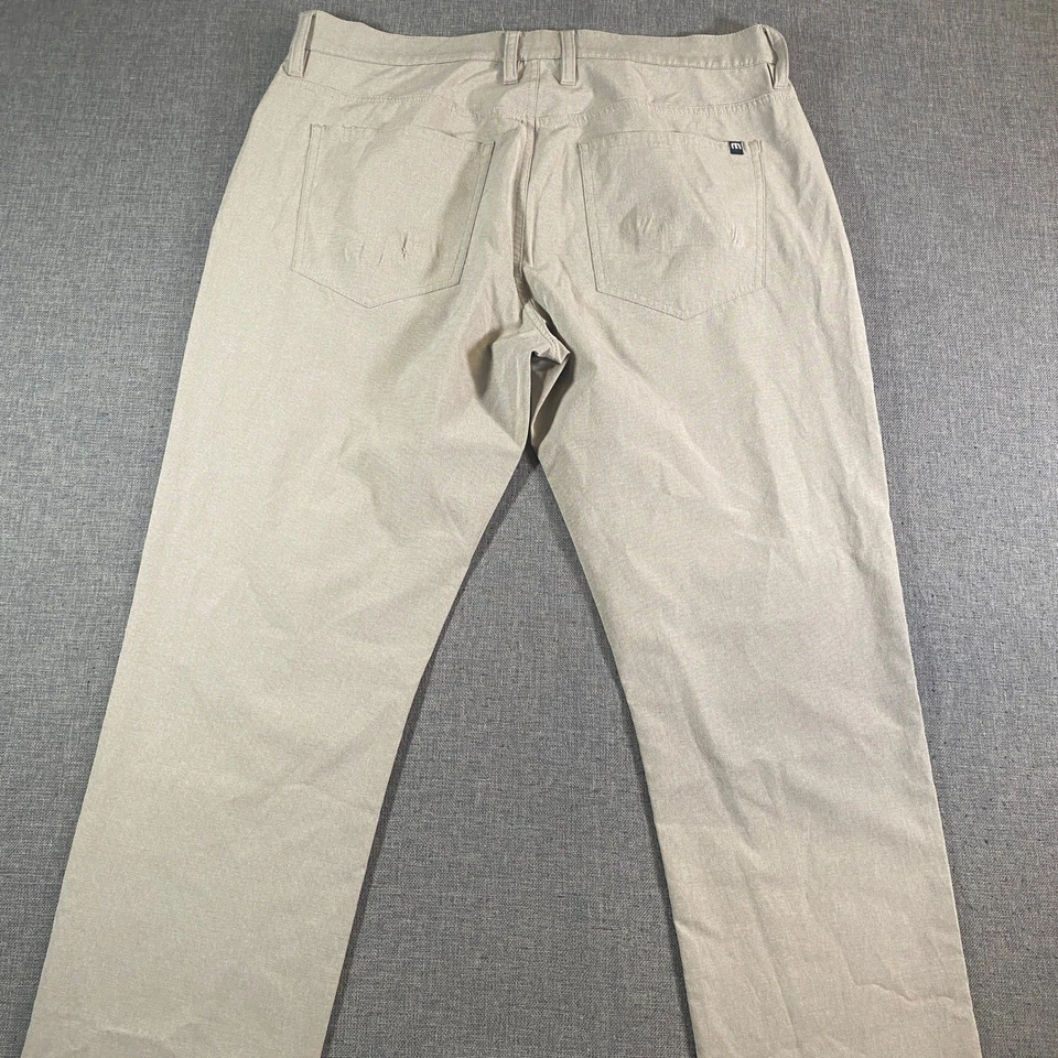 Calça de golfe Travis Mathew masculina desempenho bege tamanho 34x32 frente plana elástica - Imagem 3 de 4
