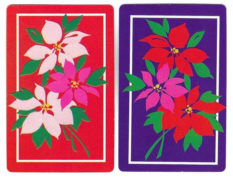 2 collect/swap playing cards featuring poinsettia plants, Trump jokers