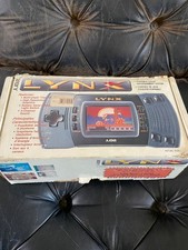 Atari Lynx Console With Case, AC adaptor, complete box, instructions, 4 games