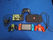 Nintendo Switch Console (Travel Case, Pro Controller,MicroSD Card)R. Description