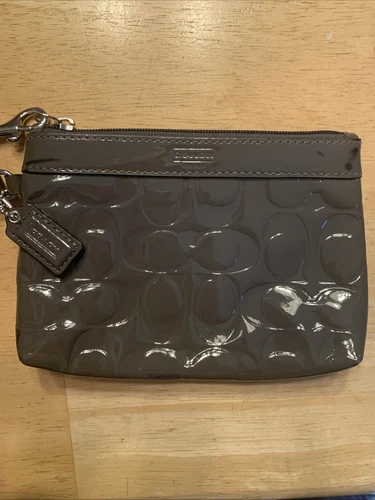 Bracciale Coach Signature in pelle verniciata goffrata canna di fucile macchie vedi foto