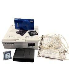 Canon PowerShot Elph 170 IS digital camera blue working  box  charger  manual