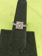 Copper Toned size 7 Ring With Large Statement Clear Stone Surrounded By Other...