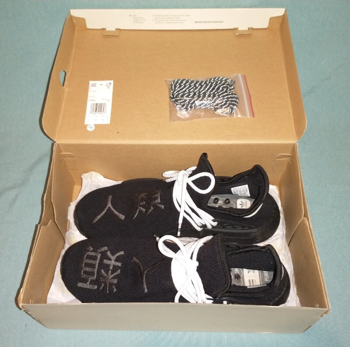 Size 12 - adidas NMD Human Race Pharrell Black box and extra GY0093 | eBay