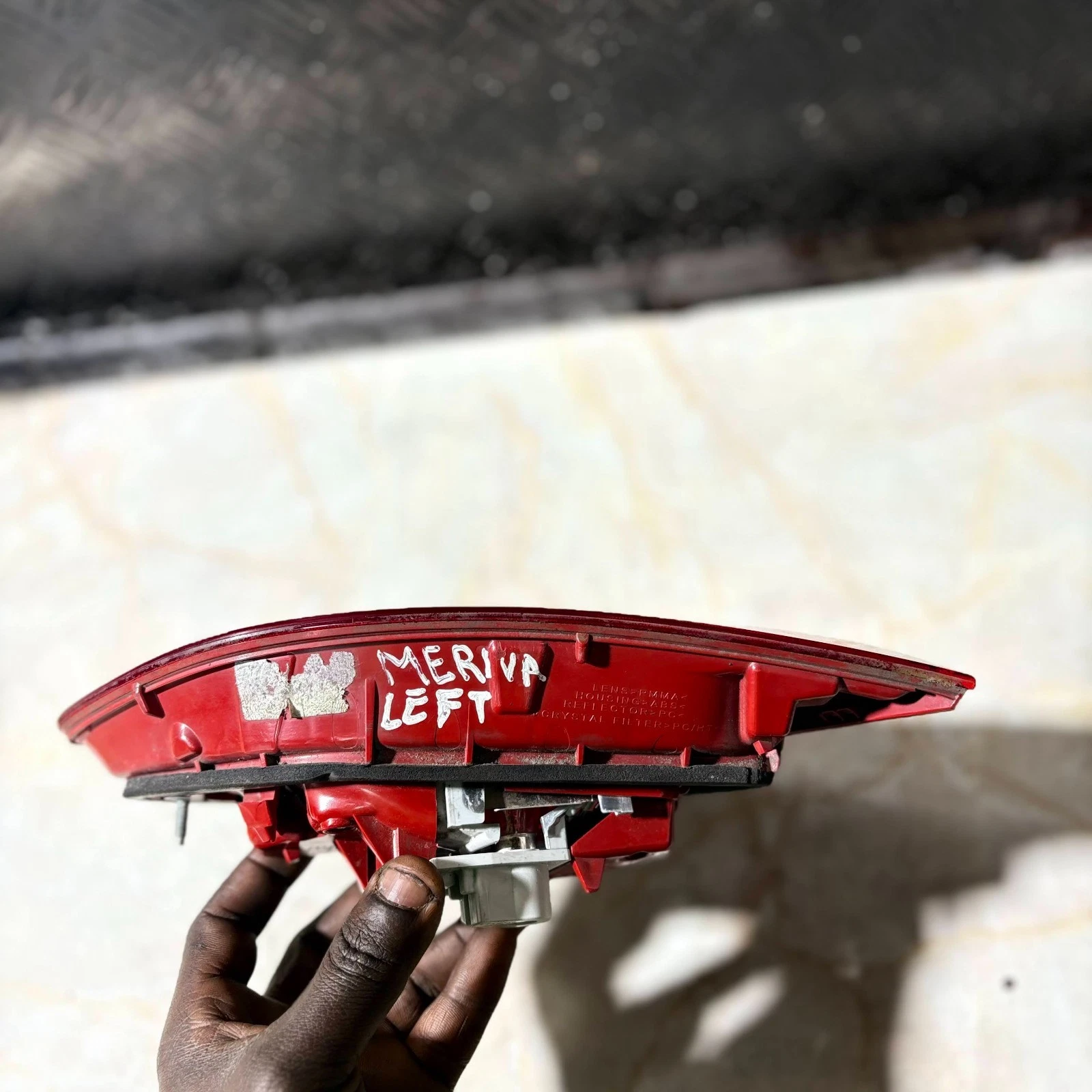 Vauxhall Meriva B left lamp moulded identification markings