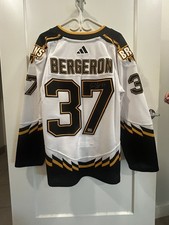 Patrice Bergeron Boston Bruins Signed Pooh Bear Official Hockey Jersey COA