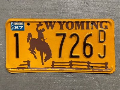 VINTAGE 1983 WYOMING LICENSE PLATE BUCKING BRONCO FENCE 1-726DJ 1987 STICKER  