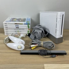 Wii Console and 7x Game Bundle - 2 Nun Chucks - Console Tested and Working