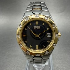 Citizen Eco-Drive Watch Women 25mm Black Dial Two Tone Date E011-S033721 Runs