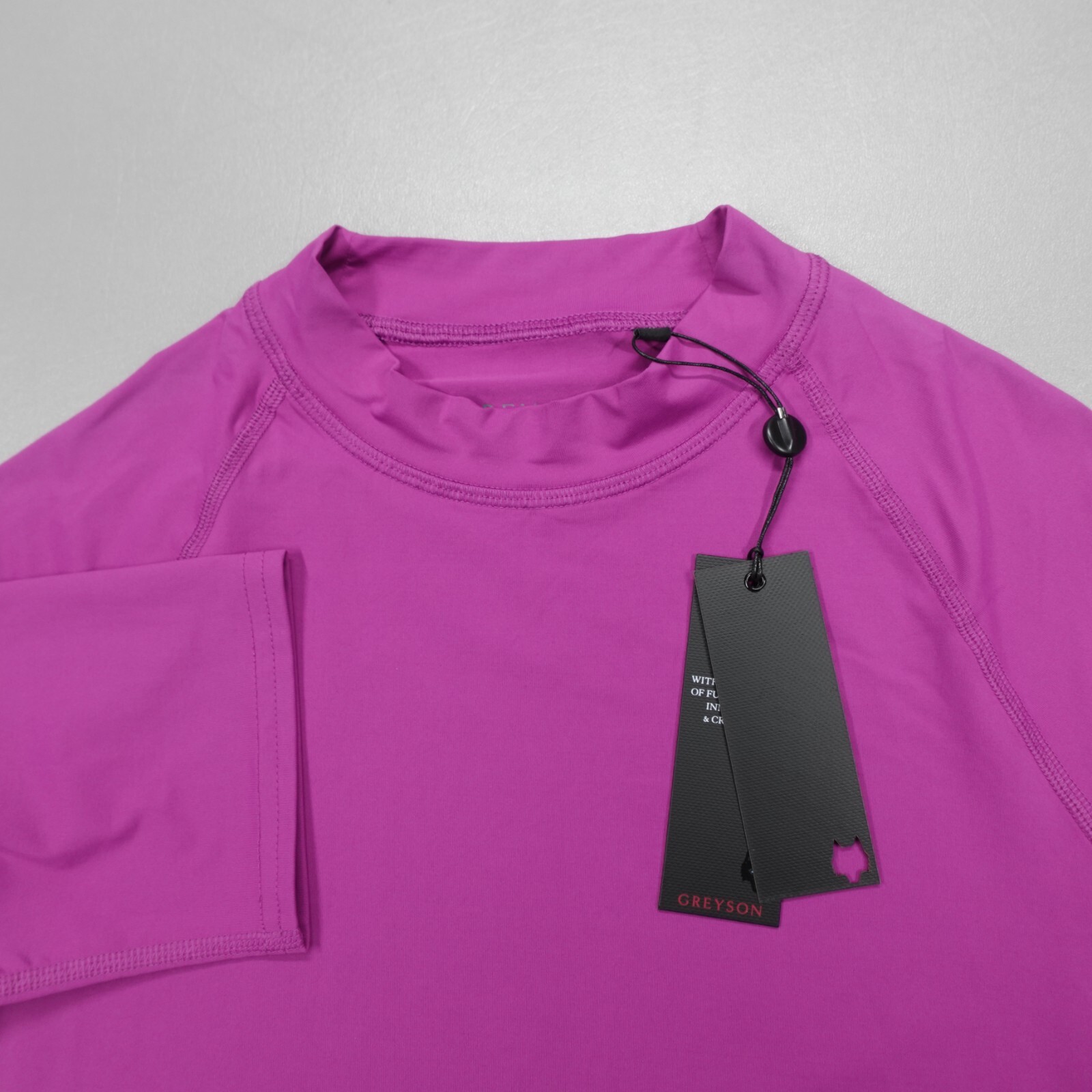 Camisa de golf Greyson Golf Sienna cuello falso buganvillas púrpura manga corta