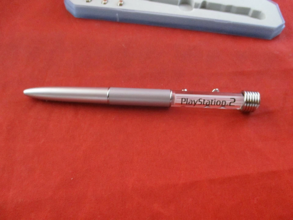 Consola Sony Playstation 2 PS2 E3 Promo Pluma Iluminada con Estuche *No escribe/Funciona* Foto 2 de 4
