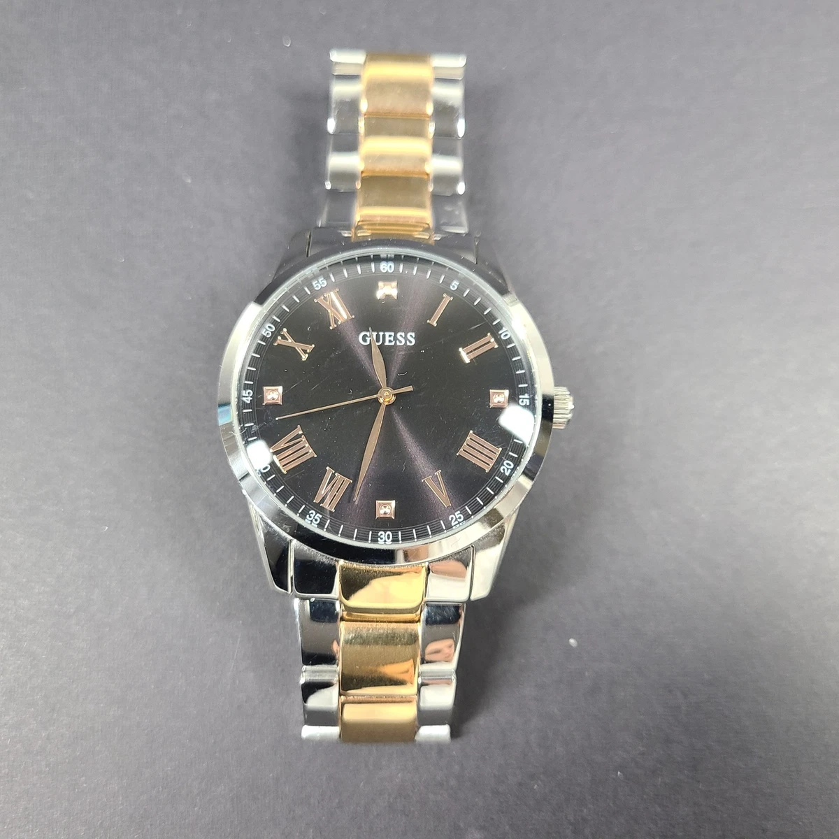 Guess gold hotsell and silver watch