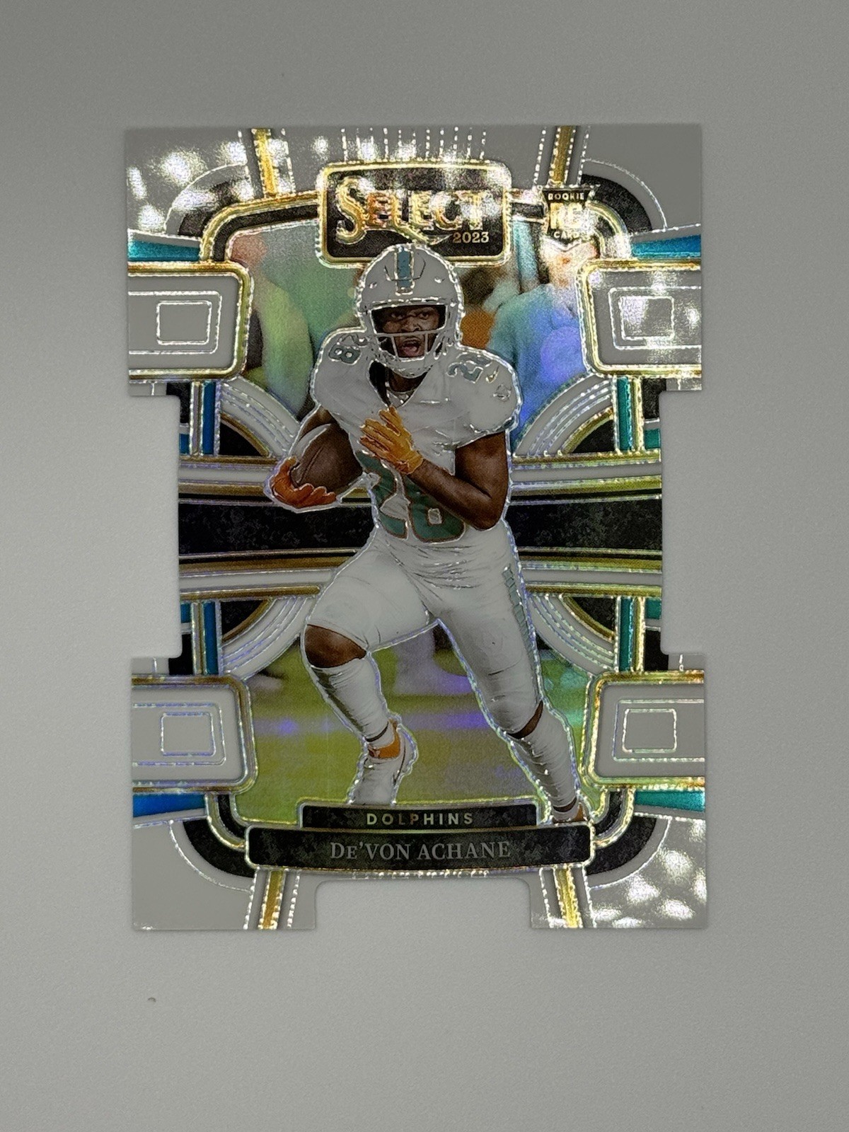 2023 Panini Select - Concourse De'Von Achane #63 White Prizm Die-Cut /199 (RC)