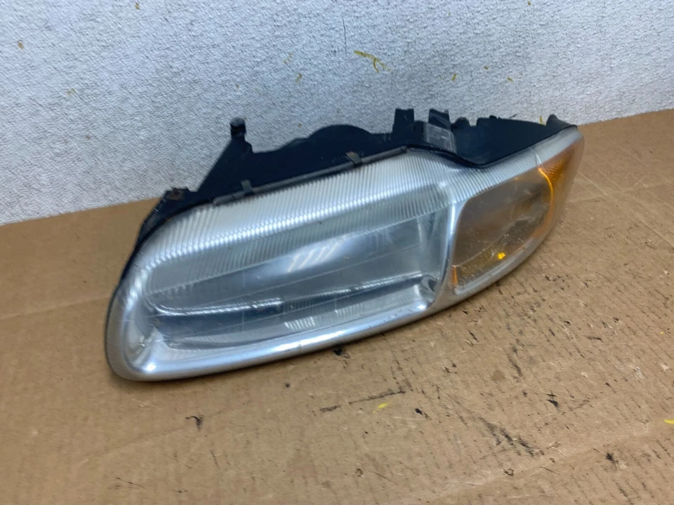 Faro halógeno lateral derecho conductor izquierdo Chrysler Sebring 1996-2000 OEM N4378 Foto 3 de 4