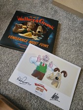 Wallace and Gromit signed postcard and film book