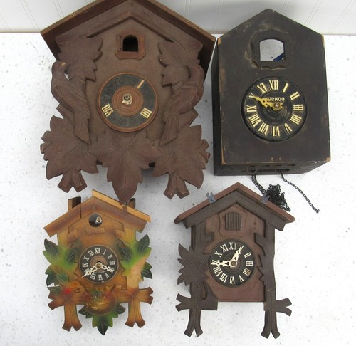 Lot of 4 Vintage Germany Cuckoo Clocks for Parts or repairs