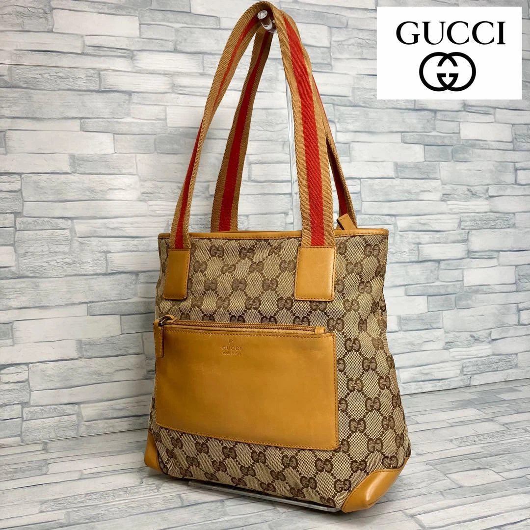 Gucci sac à main fourre tout motif Gg 95 toile bordure cuir sac à main créateur