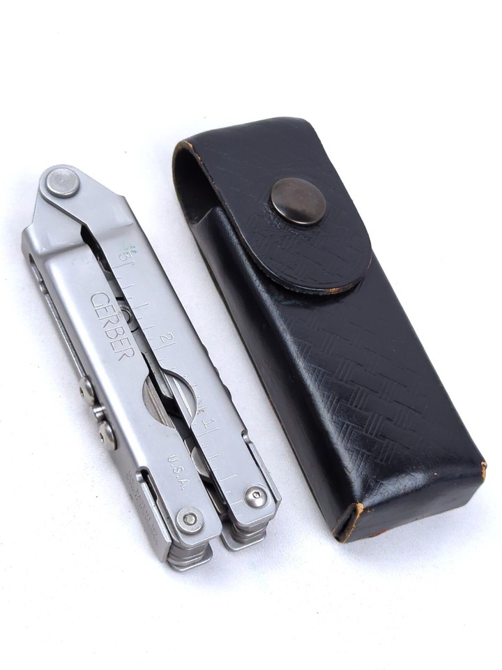 A USA-made vintage Gerber 9-way multi-tool with original leather sheath — the kind of quality EDC gear that hasn't been made like this in decades.