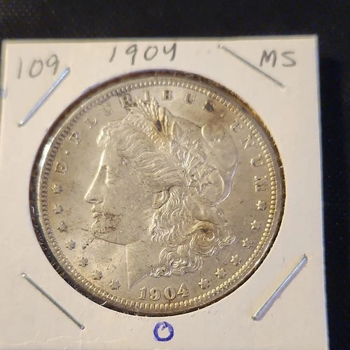 1904-O Morgan Silver Dollar In Brilliant Uncirculated Condition